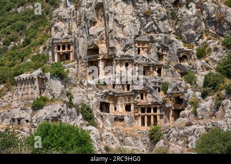 Lykische Felsengraeber in einer Felswand von Myra Antike City, Demre, Tuerkei |Lykische Felsengräber in einer Felswand von Myra Antike City, Demre, Turk Stockfoto