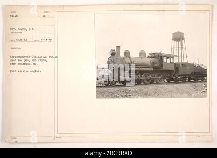 Ein Foto der Abteilung für mechanische Reparaturwerkstatt Nr. 306 und Yards in Camp Holabird in Maryland. Die Abbildung zeigt eine Wartungsmaschine im Hof mit der Nummer 57122, die von SGT geprüft wird. Kämme, S.C. Das Foto wurde am 18. Juni 1919 aufgenommen und von der Abteilung für mechanische Reparaturwerkstatt Nr. 306 herausgegeben. Es wurden keine zusätzlichen Informationen angegeben. Stockfoto