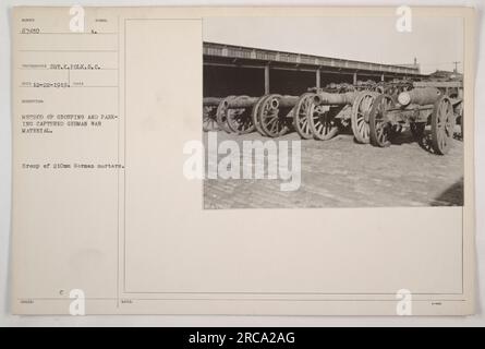 Eine Gruppe deutscher 210-mm-Mörser (Nummer 67450) wird als Teil der Organisation des gefangenen deutschen Kriegsmaterials gruppiert und geparkt. Dieses Foto wurde von Sergeant K. Polk vom Signalkorps gemacht. Eingangsdatum: 22. Dezember 1919. Symbol A. Hinweise: 67450 3-0000. Stockfoto