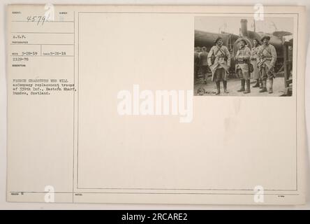 Titel: Französische Chasseurs begleiten Ersatztruppen von 339. Inf. In Eastern Wharf, Dundee, Schottland. Das Foto wurde am 20. September 1918 aufgenommen und ist Teil der Sammlung amerikanischer Militäraktivitäten während des Ersten Weltkriegs. Stockfoto