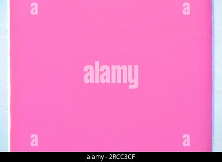 Neonrosa leere Oberfläche mit weißen Rändern Stockfoto