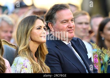 Prinzessin Madeleine und Chris O'Neill genießen ein Konzert in der Burgruine Borgholm während der 46. Geburtstagsfeier von Kronprinzessin Victoria im Solliden Palace, Borgholm, Schweden, am 14. Juli 2023. Foto: Mikael Fritzon / TT / Code 62360 Stockfoto