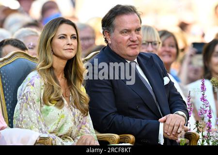 Prinzessin Madeleine und Chris O'Neill genießen ein Konzert in der Burgruine Borgholm während der 46. Geburtstagsfeier von Kronprinzessin Victoria im Solliden Palace, Borgholm, Schweden, am 14. Juli 2023. Foto: Mikael Fritzon / TT / Code 62360 Stockfoto