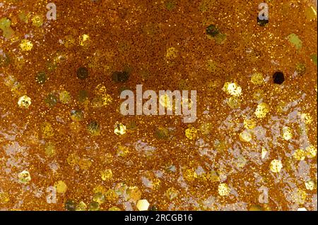 Nahaufnahme mit glänzendem Glitzer- und Schleimmuster Stockfoto