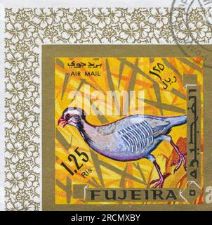 FUJEIRA - CIRCA 1972: Stempel gedruckt von Fujeira, zeigt Vogel, circa 1972 Stockfoto