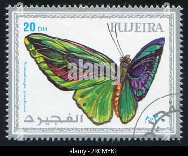 FUJEIRA - CIRCA 1972: Stempel gedruckt von Fujeira, zeigt Schmetterling, circa 1972 Stockfoto