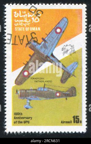 OMAN - CIRCA 1972: Stempel gedruckt von Oman, zeigt Fokker Fighter, circa 1972 Stockfoto