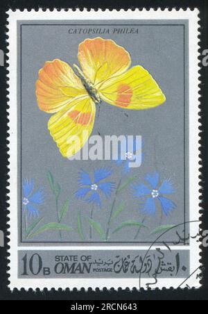 OMAN - CIRCA 1972: Von Oman gedruckter Stempel, zeigt einen Schmetterling, circa 1972 Stockfoto
