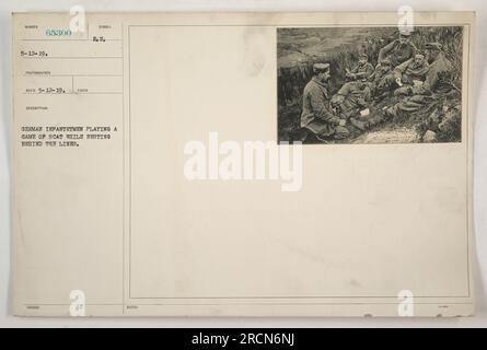 Deutsche Infanteristen, die während des Ersten Weltkriegs hinter den Linien durchbrechen, werden beim Spielen eines Spiels gesehen. Dieses Foto wurde am 12. Mai 1919 aufgenommen und zeigt Soldaten, die sich an Freizeitaktivitäten beteiligen, um sich von den Anforderungen des Krieges zu erholen. Reproduktions-ID: 65300, Fotograf: Symbel E. U. Stockfoto