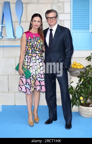 London, Großbritannien. 16. Juli 2018. Livia Giuggioli und Colin Firth nehmen an der britischen Premiere von „Mamma Mia! Hier geht's wieder" im Eventim Apollo in London. (Foto: Fred Duval/SOPA Images/Sipa USA) Guthaben: SIPA USA/Alamy Live News Stockfoto