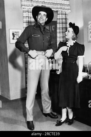 Hollywood, Kalifornien: März 1937. Schauspieler Grant Withers und Helen Chandler in der Bühnenproduktion von "Boy Meets Girl" im El Capitan Theater in Hollywood. Stockfoto