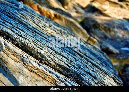 Hintergrund von Steingestein mit sonnigem Licht Stockfoto