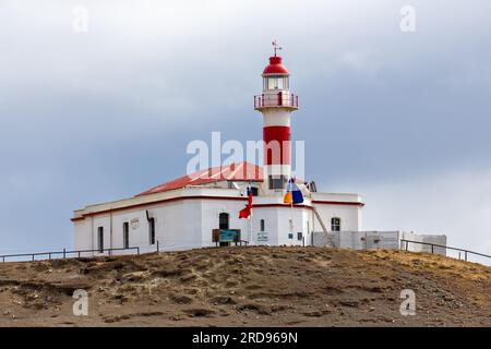 Faro Isla Magdalena, Maritime Signalling Lighthouse, Berühmtes Pinguin Reserve National Monument. Magdalena Island Magellan Strait bei Punta Arenas Chile Stockfoto