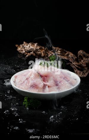 Frisches rohes Fischfilet für heiße Töpfe Stockfoto