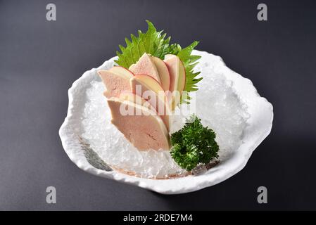 Gänseleber Sashimi，Foie Gras in Rotwein Stockfoto