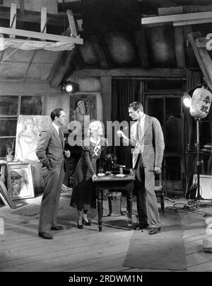 FREDRIC MARCH MIRIAM HOPKINS und GARY COOPER am Set, DIE den Film für DEN LEBENDEN 1933-Regisseur ERNST LUBITSCH drehen, spielen das Drehbuch Noel Coward Ben Hecht und Samuel Hoffenstein Kostümdesign Travis Banton Paramount Pictures Stockfoto