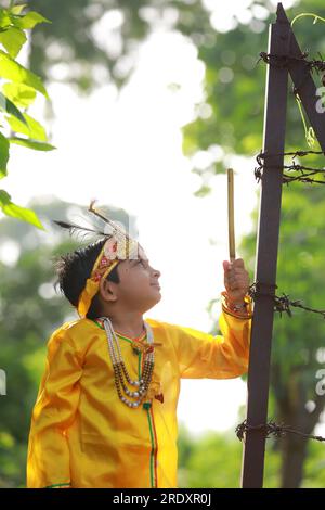 Schickes Kleid Krishna, indischer Lachs krishna Stockfoto