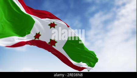 Die Nationalflagge von Burundi winkt an klaren Tagen. Weißes diagonales Kreuz, unterteilt in rote und grüne Abschnitte, drei grüne Sterne in der Mitte. 3D illustr Stockfoto