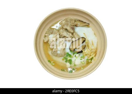 Schweineknochen mit Ingwer-Belag und schwarzem Pilz auf der Schüssel Stockfoto