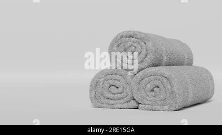 Weiße drei Handtücher Rollen auf weißem Hintergrund, weiße Spa-Handtücher werden isoliert. Leeres, gerolltes Frottee-Modell, isoliert. Sauberes einheimisches Hotelhandtuch Stockfoto