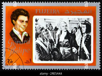 FUJEIRA - CA. 1972: Ein in Fujeira gedruckter Stempel zeigt Gerard Philipe (1922-1959), französischer Filmschauspieler, Filmstar, ca. 1972 Stockfoto