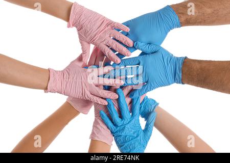 Weibliche und männliche Hände in medizinischen Handschuhen isoliert auf weißem Hintergrund Stockfoto