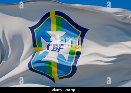 LONDON, Vereinigtes Königreich - Juli 2023: Logo der brasilianischen Nationalmannschaft auf einer fliegenden Flagge. 3D-Rendering Stockfoto