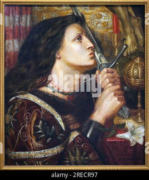 Jeanne d'Arc (1412-1431) Embrassant l'epee de la delivrance. Peinture de Dante Gabriel Rossetti (1828-1882), huile sur toile, 1863. Musée d'Art moderne de Strasbourg. Stockfoto