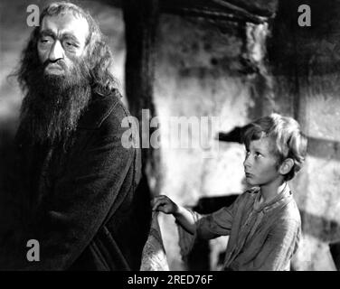 ALEC GUINNESS und JOHN HOWARD DAVIES üben Taschendiebstahl bei OLIVER TWIST 1948 Regisseur DAVID LEAN Roman Charles Dickens Produzent Ronald Neame Cineguild/General Film Distributors (GFD) Stockfoto