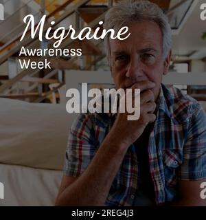 Migränebewusstseinswoche Text in weiß über gestressten Chefkaukasier zu Hause Stockfoto