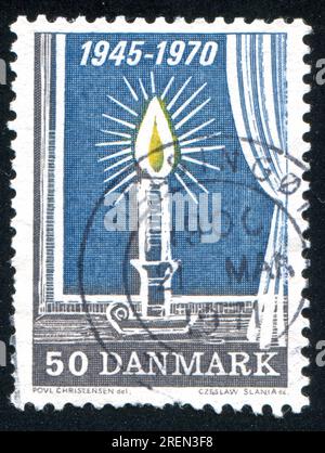 RUSSLAND KALININGRAD, 3. JANUAR 2014: Stempel gedruckt von Dänemark, zeigt Kerze, circa 1970 Stockfoto