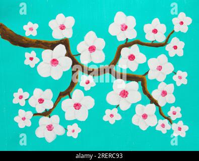 Ast mit weißen Frühlingsblumen auf Türkis Stockfoto