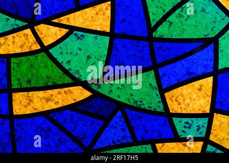 Mehrfarbiges Buntglasmosaik. Abstrakter Hintergrund. Stockfoto