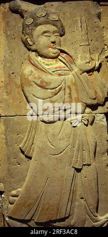 Stele en terre cuite avec musicienne, dynastie Tang (618-907), decouverte dans la Province de Shaanxi, Musee de la foret de Steles a Xian. Stockfoto