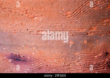 Hintergrundtonstruktur. Zufällige Linien und Kurven, die zu einem antiken Topf gehören. Stockfoto