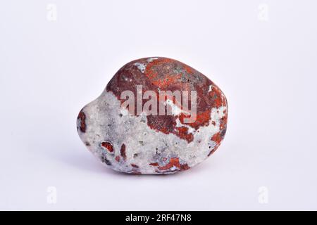 Ignimbrite ist ein vulkanischer Felsen, der durch eine versteinerte Ablagerung pyroklastischer Strömung gebildet wird. Diese Probe stammt aus Cabo de Gata, Almeria, Andalusien, Spanien. Stockfoto