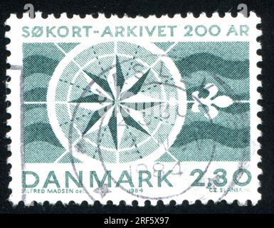 DÄNEMARK - CIRCA 1984: Stempel gedruckt von Dänemark, zeigt den Kompass, circa 1984 Stockfoto