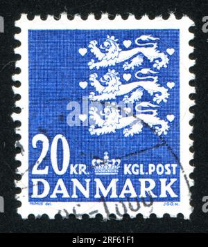 DÄNEMARK - UM 1946: Briefmarke gedruckt von Dänemark, zeigt Wappen, um 1946 Stockfoto