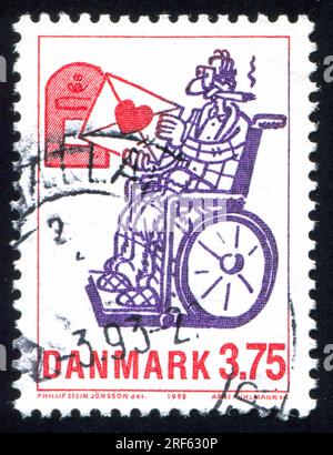 DÄNEMARK - CIRCA 1992: Stempel gedruckt von Dänemark, zeigt Cartoon Charaktere Love Letter, von Phillip Stein Jonsson, circa 1992 Stockfoto