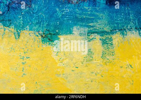 Nationalflagge des Landes Ukraine im Acryl-gemalten Grunge-Stil, blauer und gelber abstrakter Texturhintergrund Stockfoto