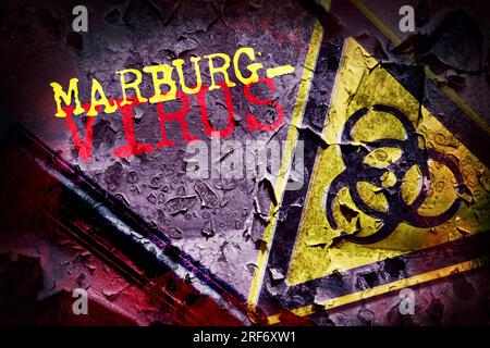 FOTOMONTAGE, Biogefährdungszeichen mit Schriftzug Marburg-Virus Stockfoto