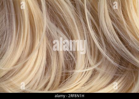 Nahaufnahme Des Hintergrunds Von Hellblonder Haarstruktur. Stockfoto
