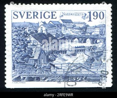 SCHWEDEN - CIRCA 1984: Von Schweden gedruckter Stempel zeigt Norrköping, circa 1984 Stockfoto