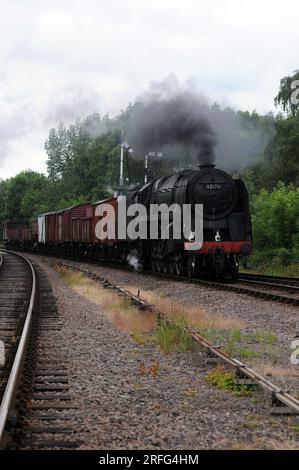 '92212' läuft als '92178' bei swithland Sidings mit einer Mischware. Stockfoto