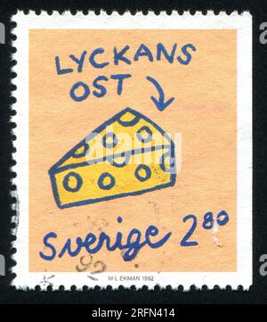 SCHWEDEN - CIRCA 1992: Von Schweden gedruckter Stempel, zeigt Käse, circa 1992 Stockfoto