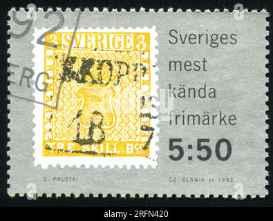 SCHWEDEN - CIRCA 1992: Von Schweden gedruckter Stempel, zeigt Wappen, circa 1992 Stockfoto