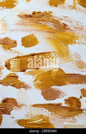 Abstrakter Hintergrund auf Baumwollleinwand in Gold-, Bronze- und Silberfarben Stockfoto