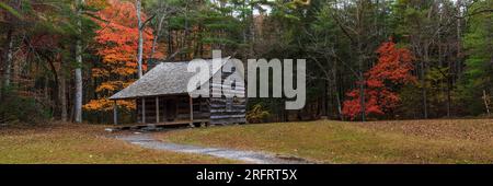 Autumn view panorama of Carter Shields cabin in the Cades Cove section of Great Smoky Mountain National Park in Tennessee Stock Photo