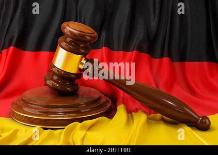 Deutsches Recht und Rechtsbegriff. Holzhammer auf der Flagge Deutschlands, 3D-Rendering Stockfoto