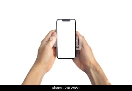 Konzept für Broschüren und Werbung. Ein Mann hält ein Telefon mit den Händen, isoliert auf weißem Hintergrund, nach einigen Änderungen. Stockfoto